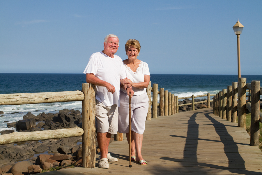 Happy senior couple at the beach in Huntington Beach, CA